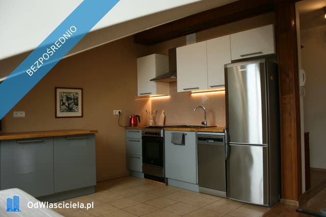 Elegancki apartament w sercu Starego Miasta w Krakowie - Zdjęcie 2/12