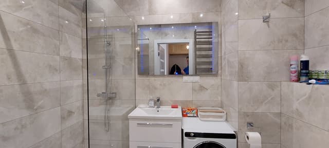 Nowoczesna kawalerka z ogrodowym tarasem i miejscem postojowym - Zdjęcie 4/25