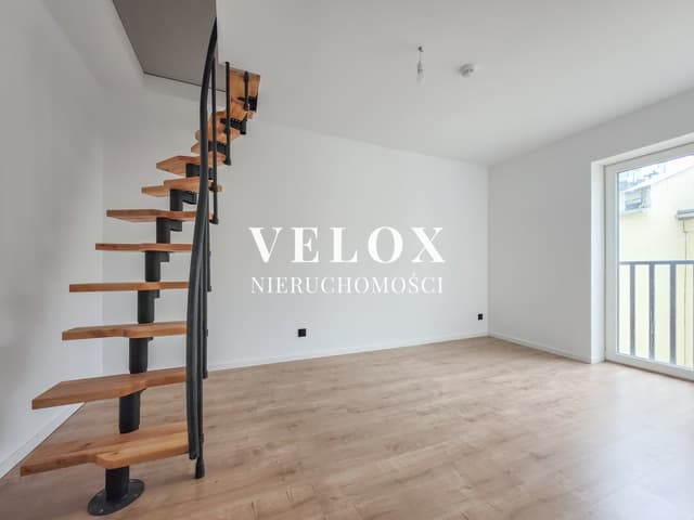 Nowy dwupoziomowy apartament z dużą antresolą w centrum - Zdjęcie 3/14