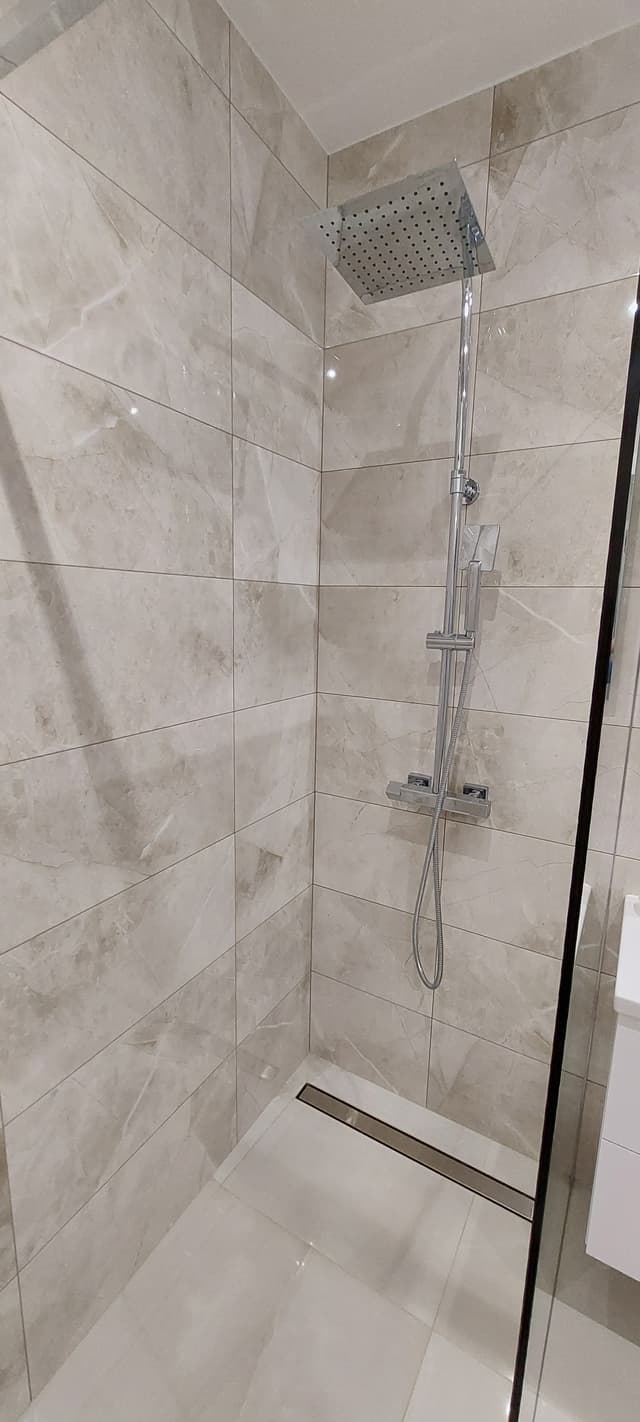 Nowoczesna kawalerka z ogrodowym tarasem i miejscem postojowym - Zdjęcie 3/25