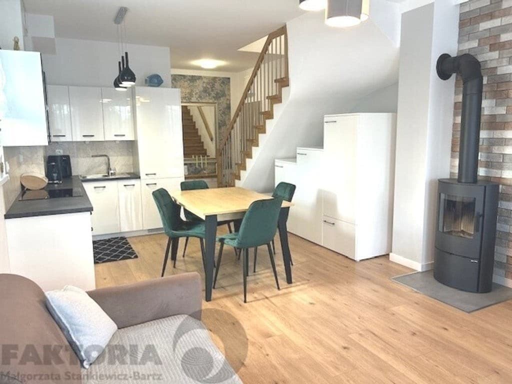 Nowoczesny dwupoziomowy apartament z kominkiem na Warszewie - Zdjęcie 1/20