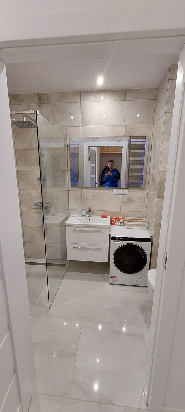 Nowoczesna kawalerka z ogrodowym tarasem i miejscem postojowym - Zdjęcie 2/25