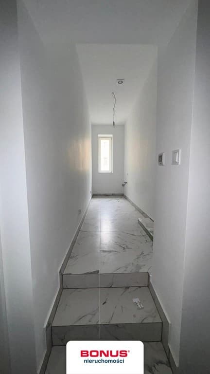 Nowoczesne mieszkanie po adaptacji stychu w Śródmieściu - Zdjęcie 4/8