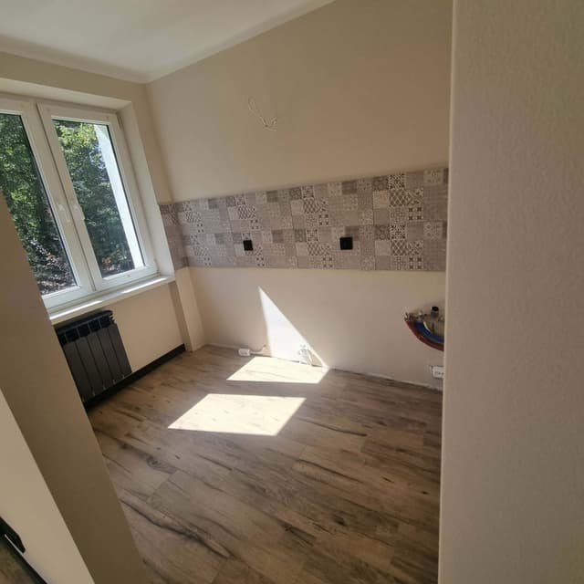 Słoneczna kawalerka po remoncie z widokiem na zieleń - Zdjęcie 5/10