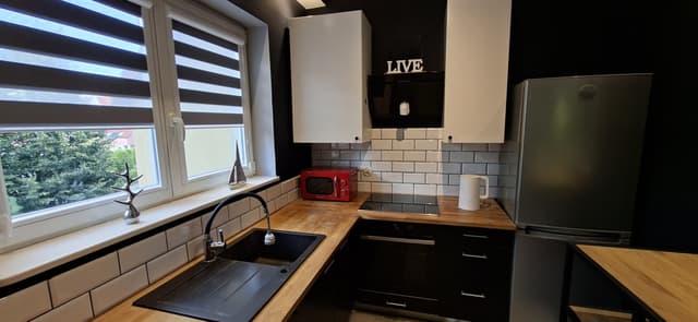 Nowoczesne mieszkanie z balkonem w spokojnej dzielnicy Kokoszki - Zdjęcie 4/24