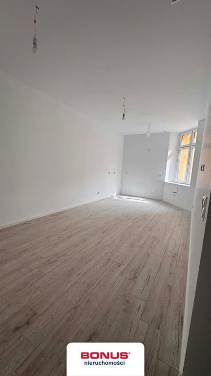 Nowoczesne mieszkanie po adaptacji stychu w Śródmieściu - Zdjęcie 2/8