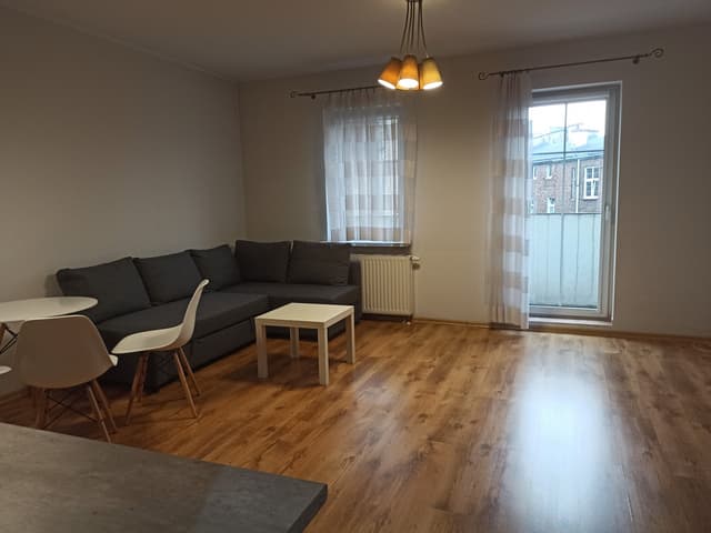 Nowoczesne mieszkanie w sercu Starego Miasta w Poznaniu - Zdjęcie 4/15