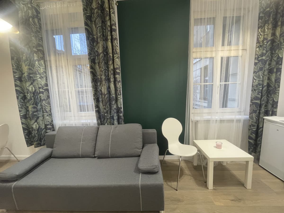 Przytulna kawalerka w sercu Starego Miasta w Poznaniu - Zdjęcie 1/8