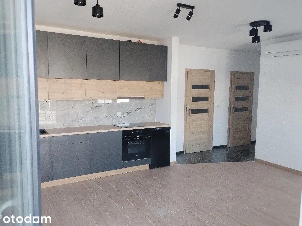 Nowoczesne mieszkanie z klimatyzacją i balkonem w nowym bloku - Zdjęcie 1/8